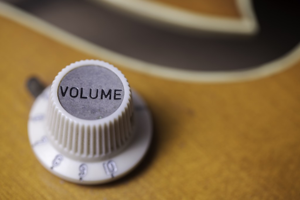 A close-up image of a volume dial turned up to high.